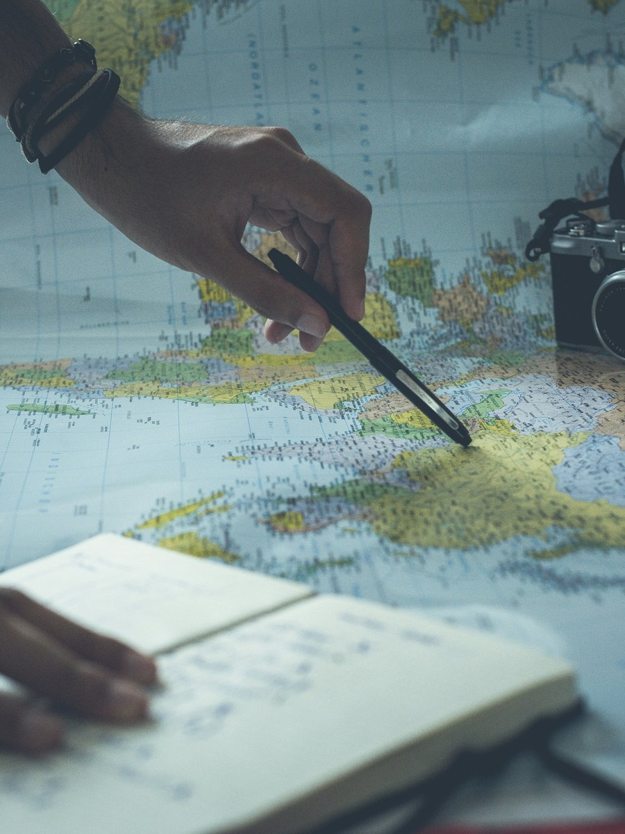 Safari planning expert reviewing a custom African safari itinerary